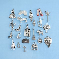 Take a look at this awesome super deluxe collection of the Wizard of Oz related charms! You will receive one of each of the 23 different pieces... These charms are made from a zinc alloy metal which is lead and nickel free. Perfect for pendants, earrings, zipper pulls, bookmarks and key chains! PLEASE NOTE: From time to time I may need to substitute one of the charms for another of equal or greater value... all keeping with the theme of the collection. Right now the witch is replaced with another smaller witch charm... Measurements range from 10mm to 28mm All of our products are lead and cadmium free, and nickel safe. As they contain small parts, all items are for adult jewelry/craft making use only, not intended for children under the age of 15. Ready to ship! Shipping from the USA - no c Crimp Bead Covers, Fandom Jewelry, Charm Collection, Beading Tools, Brick Road, Custom Charms, Beading Needles, Favorite Movie, Wine Charms