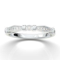 "White Gold Vintage Style Diamond Wedding Band from AurosiJewelsCouture TRY BEFORE YOU BUY! With our exclusive at home try on service. Learn more here: https://www.etsy.com/listing/481629574/ This art deco inspired diamond wedding band from Aurosi Jewels is a one of a kind, timeless masterpiece! The unique bar style setting and intricate shape of the motifs is accented with genuine diamonds that sparkle and dazzle to make it stand out amongst the crowd. There is milgrain etching to give a vintage style design, while the construction and shape of the ring make it elegant and classic. Available in white, yellow, and rose gold, as well as Platinum, this white gold vintage inspired wedding band will complete your engagement set and make her smile every time she looks down at her finger. Please Elegant White Gold Bridal Sets For Wedding, Timeless Diamond White Ring For Wedding, Luxury Wedding Stackable Rings With Single Cut Diamonds, Luxury Wedding Stackable Rings With Prong Setting, Elegant Wedding Stackable Rings With Diamond Accents, Elegant Wedding Diamond Ring With Single Cut Diamonds, White Platinum Eternity Band, Luxury Diamond Cut Stackable Rings For Wedding, Luxury Diamond White Stackable Rings For Wedding