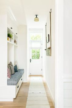 the hallway is clean and ready for us to use as a storage area in the house