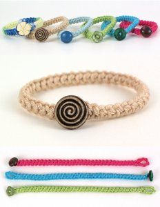 three different bracelets with buttons on them