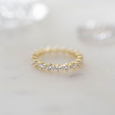 Sweet, simple, and dainty alternating CZ eternity band. Perfect for a minimalist look, or for stacking.  - - - D E T A I L S - - - * Made of 925 Sterling Silver  * We use a THICK, DURABLE 14k Gold or Rhodium plating - for a piece that will last you years to come!  * VERY HIGH QUALITY  * Available in sizes 4, 5, 6, 7, 8, 9, or 10 * Features alternating sized stones throughout the entire ring * Stone sizes: 1.5mm & 2mm * Nickel-Free & Hypoallergenic * We use the highest grade cubic zirconia stones for an authentic diamond look!  Ring Sizer- https://www.etsy.com/listing/1240904225/ring-sizer-reusable-ring-sizer-plastic?click_key=61e9f4f91cda17e59794f2a68a822a251ab4529d%3A1240904225&click_sum=ffc40ac5&ga_search_query=ring%2Bsizer&ref=shop_items_search_2&pro=1 Made with 100% Pure Love! ♡ If you Stackable Cubic Zirconia Half Eternity Rings, Minimalist Half Eternity Band In Diamond White, Minimalist Stackable Rings With Cubic Zirconia Round Cut, Minimalist Diamond White Eternity Band, Minimalist Cubic Zirconia Stackable Rings Round Cut, Minimalist Everyday Eternity Band With Round Cut, Minimalist Everyday Round Cut Eternity Band, Everyday Minimalist Round Cut Eternity Band, Minimalist Diamond White Eternity Band For Promise