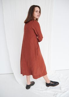 "The Elena is a casual, all-season dress with three-quarter sleeves and a button closure, making this dress functional and nursing-friendly. It is a great pick for those days when all that matters is how to get most of the day. This garment is true to size, and we recommend choosing the size you usually wear. If you want the garment to be loose-fitting, choose a larger size than you usually wear. Before placing an order, check the approximate measurements of the finished garment given below. Mod Brown Linen Long Sleeve Dress, Fall Linen Midi Dress With Buttons, Linen Midi Shirt Dress For Fall, Fall Linen Midi Shirt Dress, Fall Linen Dress With Buttons, Midi-length Linen Dress For Fall, Midi Linen Dress For Fall, Fall Linen Dress With Relaxed Fit, Relaxed Fit Linen Dress For Fall