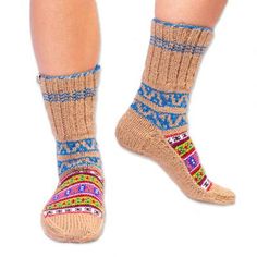 Warm your wee piggies during cold times with the help of these festive winter socks. The artisans of Himalayan Valley Knitters hand-knit the calf-length pair from a blend of acrylic and nylon crafting a cheery geometric pattern that will remind you of hot chocolate snow and ice skating. Casual Hand Knitted Socks, Casual Comfortable Hand Knitted Socks, Handmade Casual Socks For Fall, Handmade Multicolor Casual Socks, Casual Handmade Multicolor Socks, Casual Multicolor Handmade Socks, Nylon Crafts, Cold Time, Style Socks