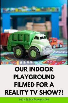 a green toy truck with the words our indoor playground filmed for a reality tv show?