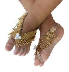 "Barefoot Baby sandals, Barefoot Sandals, Fringe Baby Sandals, Gold Sandals, Gold Sandals, Barefoot Baby Sandals, Baby Barefoot Sandals These Gold Fringe Baby Barefoot Sandals are just perfect for any age! The front part of this sandals will not stretch but there is enough stretch elastic on the back for a perfect fit.  All my products are designed to make your baby look beautiful while feeling really comfortable. My Baby Headbands and Baby Barefoot Sandals come displayed on a printed card, they Adjustable Closed Toe Party Sandals, Adjustable Closed Toe Barefoot Sandals For Summer, Closed Toe Barefoot Sandals For Beach, Closed Toe Barefoot Sandals For Summer Beach, Adjustable Non-slip Sandals For Beach, Adjustable Closed Toe Barefoot Sandals For Beach, Adjustable Toe Ring Sandals For Summer Parties, Gold Barefoot Sandals For Summer Gift, Adjustable Barefoot Sandals For Spring Party