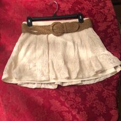 Size Small Juniors Ivory Crocheted Lace Skirt With Lining Underneath. Flowy Mini Skirt With Dark Tan Adjustable Belt. Excellent Condition Nwt Beige Flowy Lace Skirt, Elegant Lace Bottoms For Vacation, Beige Bottoms With Lace Trim Flowy Design, Summer Casual Lace Mini Skirt, Casual Lace Mini Skirt For Summer, Lace Skirt For Day Out, Casual Lace Skirted Bottoms, Casual Skirted Lace Bottoms, Cream Lined Skort For Summer