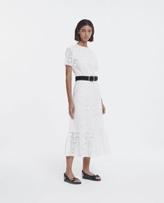 Long white embroidered dress with crew neck | The Kooples - US Frilly Skirt, White Embroidered Dress, Black Leather Sandals, The Kooples, Modern Outfits, Embroidered Dress, Lace Skirt, Long Dress, White Dress