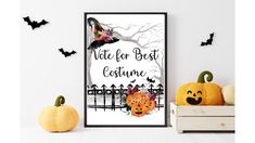 a halloween poster on the wall with pumpkins and bats in front of it that says,'cute for best costume '