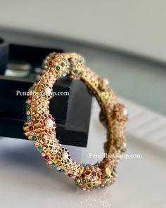 Jadau Kundan Rajasthani Bangles. It comes as a single piece . Formal Jeweled Kundan Bangle, Traditional Kundan Bangle, Party Multicolor Kundan Bangle, Handmade Multicolor Kundan Bangle, Kundan Multicolor Bangle, American Diamond Necklaces, Oxidized Necklace, Polki Necklace, Western Earrings