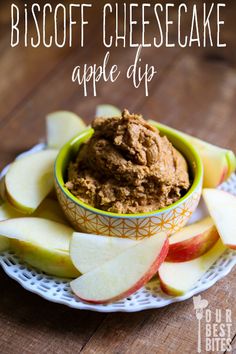 a bowl filled with food sitting on top of a white plate next to sliced apples