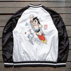 BAIT x Astro Boy Men Mighty Atom Souvenir Jacket (black / white) $139.99 White Retro Varsity Jacket With Letter Print, Retro White Varsity Jacket With Letter Print, Vintage White Varsity Jacket For College, White Outerwear With Graphic Print And Baseball Collar, Vintage White Outerwear With Graphic Print, White College Varsity Jacket With Graphic Print, College White Varsity Jacket With Graphic Print, White Varsity Jacket With Graphic Print For College, White Varsity Jacket With Graphic Print