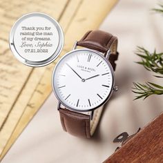 "This custom-made watch is just what you need to thank your father-in-law for all he's done on your wedding day. The stainless steel design and genuine leather band are sure to impress, and the ability to engrave a sentimental message makes this gift extra special. Express your gratitude in a truly unique way with this one-of-a-kind timepiece. --- ITEM SPECIFICATIONS --- * Type: Quartz Movement, Battery Powered * Case Material: Stainless Steel * Dial Diameter: 41mm * Case Thickness: 8mm * Glass: Engraved Watch, Boyfriend Watch, Personalized Watches, Watch Engraving, Wedding Gifts For Groom, Great Gifts For Dad, Personalized Anniversary Gifts, Bride And Groom Gifts, Anniversary Gifts For Husband