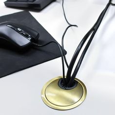 a computer mouse sitting on top of a desk