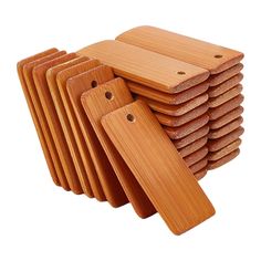 a stack of wooden cutting boards sitting on top of each other