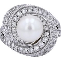 Savor the intricate designs of elegance with the Platinum 900 9mm Pearl Center Ring. This exquisite piece features a lustrous 9mm pearl as its main stone, exuding timeless sophistication. Surrounding the pearl are shimmering diamonds with a total weight of 1.85 Carats, adding a touch of luxury and brilliance to the ring.Crafted with Platinum 900, this ring not only embodies enduring beauty but also represents exceptional quality and craftsmanship. The size 7.5 ensures a comfortable and perfect fit for everyday wear or special occasions. Whether you're adding to your own collection of fine jewelry or searching for a meaningful gift, this Platinum 900 Pearl Center Ring is sure to captivate with its classic charm and allure.Indulge in the allure of pearls and diamonds, and elevate your style Luxury Pearl Ring For Anniversary With Round Band, Luxury White Gold Pearl Ring With Diamond, Luxury Timeless Pearl Ring With Diamond Accents, Luxury Platinum Pearl Ring, Luxury Pearl Ring With Diamond Accents, Luxury Round Cut Pearl Ring, Luxury Vintage White Gold Pearl Ring, Luxury Brilliant Cut Pearl Ring In Sterling Silver, Elegant Platinum Pearl Ring, Luxury