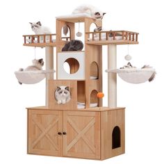 two cats are sitting on top of a cat tree house that is made out of wood