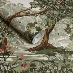 a wallpaper with trees and flowers in the background, as well as a roll of toilet paper