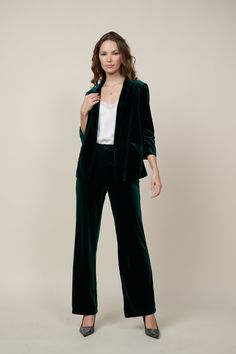 A pair of velvet pants will always look right when getting dressed up in the cooler months. This one's done in a wide-leg silhouette that's polished yet comfortable, elasticized at the back waistband for a precise fit. Go plush from head to toe by adding our velvet blazer on top. AVAILABLE IN PLUS •Zip fly •Slant front pockets •Wide-leg silhouette •Elasticized back waistband •Welted back pockets DIMENSIONS •Standard: 29" Inseam Length Item number 73389 90% Polyester 10% Spandex