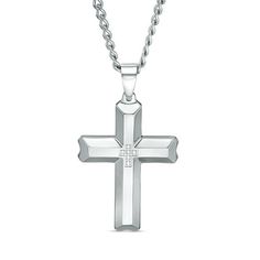 Celebrate his love of fashion with this classic diamond cross pendant. Fashioned in stainless steel, this clean-cut design features a cross-shaped arrangement of shimmering white diamonds atop a sculpted satin-finished cross. Polished bevelled edges lend further dimension to the look. Radiant with 1/20 ct. t.w. of diamonds and buffed to a brilliant luster, this pendant suspends along a 24.0-inch curb chain that secures with a lobster claw clasp. Luxury Diamond-cut Cross Necklace As Gift, White Gold Polished Cross Necklace, Formal Polished Cross Necklace, Polished Cross Necklace For Formal Occasions, Formal Polished Cross Pendant Necklace, Classic Diamond Cut Cross Necklace In White Gold, Elegant Stainless Steel Cross Necklace, Formal Silver Crucifix Cross Necklace, Silver Cross Necklace With Diamond Accents