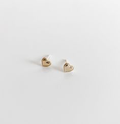 14k gold filled heart studs Gold Heart Earrings With Heart Detail, Gold Plated Heart Earrings As Gift, Cute Gold Earrings With Heart Charm, Gold Plated Heart Earrings For Gift, Gold-plated Heart Earrings For Gift, Gold Minimalist Heart Earrings For Everyday, Dainty 14k Gold-filled Earrings With Heart Charm, Minimalist 14k Gold Heart Earrings, Cute Gold Heart Earrings For Gift