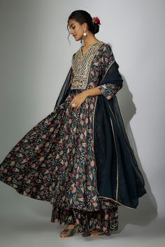 Navy blue anarkali with floral print and zardosi, marodi embroidery. Paired with a gharara and dupatta. - Aza Fashions Anarkali Sets With Cutdana In Maxi Length, Chanderi Sharara For Transitional Season, Maxi Length Chanderi Sharara With Dupatta, Traditional Embroidered Maxi Palazzo Set, Traditional Embroidered Maxi Length Palazzo Set, Traditional Zari Work Maxi Palazzo Set, Traditional Zari Work Maxi Length Palazzo Set, Embroidered Chanderi Maxi Sharara, Traditional Maxi Palazzo Set With Zari Work