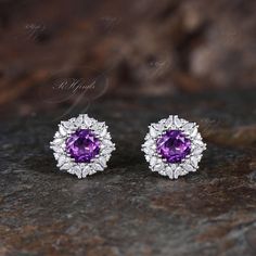 Product Detail Material: 925 Sterling Silver, 10k/14k/18k Solid Rose/White/Yellow Gold, Platinum Quantity: 2pcs (a pair) earrings Center Stone: 6.5mm Round Cut Natural Amethyst Side Stones: Marquise Cut and Round Cut Moissanites Custom Service 1, Gemstones can be replaced with others. 2, All metal can be customized. 3, The earrings can be customized according to the design you want. Please contact us if you need any personalized custom earrings. We will try our best to meet your needs. Only you can't think of it, we can't do it without us. Shipping It's made-to-order jewelry, it will take 2-4 weeks to make it. Once the pendant/necklace is finished, it will be sent by USPS, FedEx or DHL. Return & Refund There is a 30-day return guarantee. But as it's handmade pendant/necklace, handcrafted f Gemstone Cluster Earrings For Anniversary, Round Gemstone Cluster Earrings For Anniversary, Anniversary Cubic Zirconia Gemstone Cluster Earrings, Anniversary Gemstone Cluster Earrings With Cubic Zirconia, Anniversary Cluster Earrings With Gemstones And Cubic Zirconia, Diamond Earrings With Accent Stones For Anniversary, White Gold Cluster Earrings With Cubic Zirconia Gemstones, Diamond Cluster Earrings With Gemstones For Anniversary, Anniversary Diamond Earrings With Accent Stones