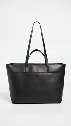 Mansur Gavriel Large Tote Bag | Shopbop Sleek Leather Shoulder Bag For Travel, Sleek Formal Bags With Leather Handles, Formal Sleek Bags With Leather Handles, Sleek Business Bags With Leather Handles, Sleek Leather Tote Shoulder Bag, Sleek Leather Bag With Smooth Grain, Sleek Leather Shoulder Bag With Double Handle, Sleek Leather Bag With Double Handle, Sleek Shoulder Bag With Leather Lining For Business