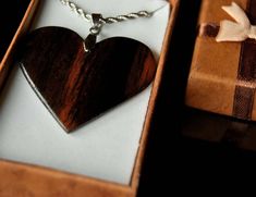 Thank you for checking out Jack&Lady jewelry! Our necklace for women is handmade from sustainable wood, sourced from around the world. We use veneers to make the pendant durable. Minimalistic style with very unique wood, every pendant we made is rare, lightweight has a beautiful finish, and is hypoallergenic. Each wooden pendant is made only with hands, love, and care. ♥ Why you'll love it ♥ ❯ Handmade with love and care, no power tools used. ❯ All our wooden pendants are made with the layer Wood Necklace Pendant, Minimalistic Style, Gift Valentine, Wood Necklace, Ebony Wood, Wooden Pendant, Wood Pendant, Valentines Gifts For Her, Valentine Gift