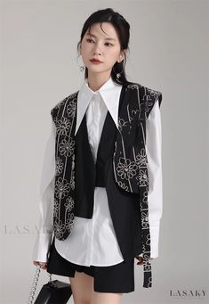 Lasaky - Sleeveless Open Cardigan with Exquisite Jacquard and Embroidery Design Sleeveless Spring Outerwear With Floral Embroidery, Sleeveless Outerwear With Floral Embroidery For Spring, Sleeveless Floral Embroidery Spring Outerwear, Sleeveless Floral Embroidered Spring Outerwear, Winter Floral Embroidered Sleeveless Vest, Fitted Sleeveless Outerwear With Floral Embroidery, Fitted Sleeveless Floral Embroidered Outerwear, Elegant Sleeveless Sweater Vest For Spring, Embroidered Sleeveless Vest For Fall