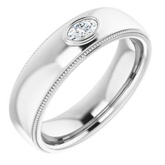 a white gold wedding ring with a diamond in the center and beading around it