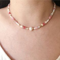 "The freshwater pearl stands out among small Rondell Cylinder Beads, Flat Round Stone Beads and golden spacer beads, it symbolize the \"One and only\" Her. It's the perfect jewelry gift choice for Her. Boho necklace with romantic white and pink color" Beaded Necklace White, Boho Beaded Necklace, Pink Choker, Beaded Flats, Freshwater Pearl Necklace, Pink Necklace, Necklace White, Freshwater Pearl Necklaces, Matching Bracelets