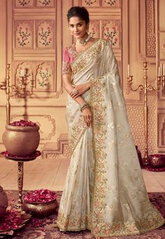 Chinon Saree with blouse in Cream colour 8004 Desc: Color : Cream Fabric : Chinon Georgette Work : Embroidery Sequence Wash Care : Dry clean Sleeve Style : Half Sleeve Long Sleeves : Done only in Custom Stitch Sleeves Lining : Done only in Custom Stitch Bust Size : 32 to 42 Inches Occasion : Wedding Festival Diwali Mehendi Sangeet Engagement Reception Ceremonial Party Wear. With Express Free Shipping Buy Indian Party wedding and bridal Sarees Chinon Saree with blouse in ... Off White Saree, Dupion Silk Saree, Reception Saree, Wedding Sarees Online, Sabyasachi Lehenga, Perhiasan India, Party Mode, White Saree, Red Lehenga