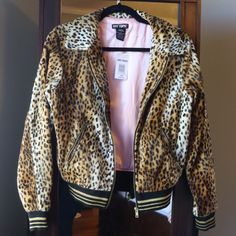 Hot Topic Fuzzy Cheetah Print Jacket Never Worn- With Tags Pink Satin Lining Fuzzy Plush Outer Gold Accents And Zipper Size Small So Cute! If You Have Any Questions Please Let Me Know! Tags: Hot Topic Cheetah Jacket Bomber Satin Funny Plush Gold Pink New Trendy Fitted Leopard Print Outerwear, Cheetah Jacket, Cheetah Print Jacket, Plush Jacket, My Shopping List, Print Jacket, Pink Satin, Cheetah Print, Hot Topic