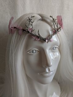 This gorgeous woodland tiara features pink leaves surrounding the naturally wrapped base, and a gorgeous moon and branches decorating the center. A matching pink gem is set in the middle of the moon and large pink ombre leaves decorate the sides. Perfect for any occasion you choose or to add a magical touch to your everyday! Choose between silver charms as pictured or bronze! Pink Crown Headpiece For Wedding, Pink Wedding Crown Headpiece, Whimsical Pink Crown Headpiece, Whimsical Pink Headpieces As Gift, Pink Whimsical Headband Headpiece, Whimsical Pink Headpieces For Gifts, Handmade Pink Headpiece As A Gift, Pink Headband Gift Headpieces, Pink Adjustable Handmade Headpiece