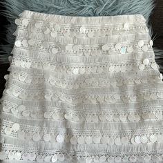 Size 10, Beautiful Sequined Mini Skirt With Fringe Hem. Side Zipper. Tags Removed, New/Never Worn. Chic White Bottoms With Fringe, Spring White Skirt With Tassels, White Tassel Skirt For Spring, White Bottoms With Tassels For Spring, Chic White Skirt With Fringe, White Fringed Bottoms For Summer, Spring Fringe Mini Skirt, White Fitted Fringe Skirt, Summer Fringe Tiered Skirt