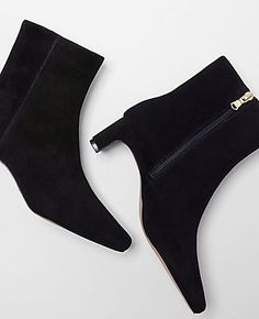 Elevate your style with the Ann Taylor Blade Heel Suede Booties, a perfect blend of luxury and comfort. These booties are meticulously crafted from rich, black suede, offering a sophisticated look for any occasion.

- Size: 5
- Color: Black
- Material: Suede
- Gender: Female
- Shaft Height: 5 3/4 inches
- Circumference: 5 inches
- Heel Height: 3 inches

Designed with a padded footbed for ultimate comfort and a sleek 3-inch blade heel, these booties ensure both elegance and practicality. Whether Suede Ankle Boots With 4-inch Heel, Fitted Suede Booties Chic Style, Fitted Suede Booties For Fall, Chic Fitted Suede Booties, Modern High Ankle Suede Heeled Boots, Elegant Suede Booties, Elegant Fitted Suede Booties, Chic Suede Heeled Boots With 4-inch Heel, Modern Suede Heeled Boots For Fall