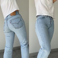 "Vintage Levi's 501 w27 L25 made in USA  stone Wash light blue faded vintage 501s Follow on Instagram for new listing  Vintage Denim Edit   100% Cotton no stretch. Please make sure size is good for you as no returns.  please read measurements before buying and ask any questions no returns Ask questions if you need help please don't buy without checking.  Measurements taken laying flat.  please read measurements below before buying   Lovely light blue USA button 524 Cut at hem  Waist 35cm/13.7\" across flat (The 27.5\"total) Crotch to waist 28.5cm 11.2\" Hips 53cm\" across flat 20.8\" total 41.7\"  Thigh across flat 27cm/10.6\" across  inside leg from crotch 63cm 25\"  Ankle 18.5cm/ 7.2\" across flat  If you have a pair of vintage Levi's compare measurements to get the best fit. Also always 501 Outfit, Levis 501 Women, Light Wash Levis, Jean Vintage, Vintage Levis 501, Levi’s 501, Black Long Sleeve Top, Levi's 501, Denim Style