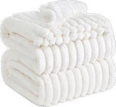 a stack of white towels stacked on top of each other in front of a white background