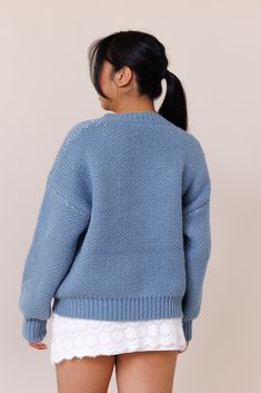 Our Blue Bow Sweater is a cozy, oversized piece made from heavy knit fabric. It features an oversized fit, balloon sleeves, cuffed hems at the sleeves and waist, and a large bow detail for a cute touch. Stay warm this season with this must-have sweater. Model wears a size small Model is 5'1" 100% Polyester Size small measurements: Bust: 48" Waist: 36" Length: 22" Bow Sweater, Heavy Knit, Large Bow, Blue Bow, Balloon Sleeves, Bow Detail, Stay Warm, Knit Fabric, Knitted Fabric