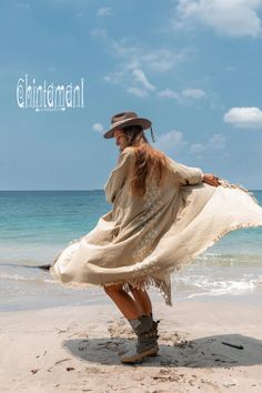 Beige Winter Outerwear For Festivals, Beige Kimono With Long Sleeves For Festivals, Beige Long Sleeve Kimono For Festivals, Beige Long Sleeve Bohemian Kimono, Bohemian Beige Kimono For Fall, Beige Bohemian Kimono For Fall, Oversized Bohemian Wrap Outerwear, Beige Winter Outerwear For Vacation, Bohemian Wrap Outerwear For The Beach