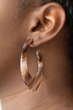 Lined in brown and white details, a shiny acrylic frame curves into an asymmetrical hoop for a colorfully retro look. Earring attaches to a standard post fitting. Hoop measures approximately 1 1/4" in diameter. Color may vary.   Sold as one pair of hoop earrings. Paparazzi Jewelry Images, Brown Acrylic, Brown Earrings, Acrylic Frame, Earrings Trendy, White Details, Acrylic Frames, Paparazzi Accessories, Affordable Jewelry