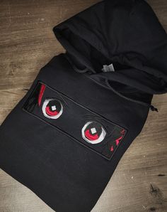 Anime Embroidered Hoodie, Black anime with accent color. Full embroidery on true to size hoodie Anime Embroidered Hoodie, Black Harajuku Style Cotton Hoodie, Black Cotton Harajuku Style Hoodie, Black Anime Print Hoodie With Crew Neck, Black Anime Print Crew Neck Hoodie, Black Harajuku Hoodie With Adjustable Hood, Black Crew Neck Hoodie With Anime Print, Black Hoodie With Embroidered Logo, Black Hooded Hoodie With Anime Print