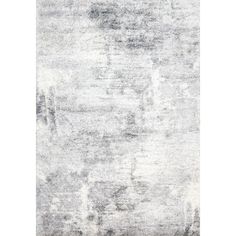 an area rug with grey and white colors on the floor, in front of a white background