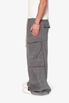 the Corduroy Rave Double Cargo Pants are designed with a new oversized rave fit, constructed from a cotton corduroy fabric, contrast drawcord, and finished with cargo pockets throughout. details ultra baggy fit throughout 100% cotton extended inseam model is 6’1, 140 lbs and wears a size 30 Grey Baggy Pants, Rave Fit, 140 Lbs, Nylon Pants, Corduroy Fabric, Baggy Pant, Denim Patchwork, Baggy Fits, Denim Wash