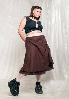 Ruched vintage skirt, a real Y2K gem in mint condition. It's made of pure brown cotton and has a zip closure. Save the planet & ditch fast fashion once and for all! Our model, Sawa is 170 cm / 66.3" tall and she's a size XXL. Size: XXXL / US 14 / UK 18 / IT 50 Other size info: Labelled size: EUR 50 Measurements:  waist: 104 cm / 40.6" length: 74 cm / 28.9" Fabric: cotton  Care: Machine wash cold Fitted Brown Tiered Skirt, Brown Vintage Tiered Skirt, Vintage Brown Tiered Skirt, Real Y2k, Aesthetic Plus Size, Slip Dress Y2k, Plus Size Y2k, Fairycore Cottagecore, Vintage Slip Dress