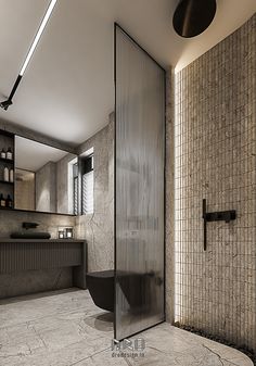 a bathroom with a glass shower door next to a sink and counter top in front of a mirror