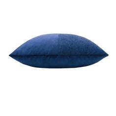 a blue pillow on a white background