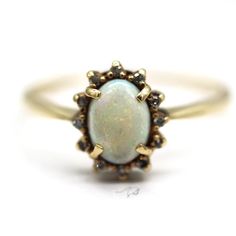 ⚓10k Yellow Gold Natural Opal and Diamond Ring (size9) Solid 10k gold, stamped 10k. Not filled or plated.  In excellent condition. We sell the highest quality vintage and pre-owned items! Free domestic shipping always! On its way to you in 1 business day.  30 day return policy!  ⚓The Details Size 9 1 Oval natural opal 12 natural round diamonds Weighs 2.0 grams  ⚓Who We Are  We are a small, family-owned business in Plymouth, MA. Located in the heart of Main Street, Main Street Jewelry Co.'s missi Street Jewelry, Opal And Diamond Ring, Silver Chains, Small Family, Jewelry Inspo, Natural Opal, 10k Gold, Main Street, Cute Jewelry