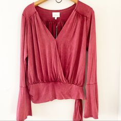 New With Tags Anthropologie Deletta Red/Rouge Bell Sleeve Blouse With A Bohemian Silhouette Wrap Style Side Ribbon Belt Has The Distressed Vintage Look In The Material. Measurements Are Approximately Armpit To Armpit 19" Length 20" Sleeve Length 23" Soft Wrap Style Bell Sleeves Side Tie Clstl Red Long Sleeve Bohemian Blouse, Pink Bell Sleeve Blouse, Red Flowy V-neck Blouse, Red Bell Sleeve Top, Bohemian Red Embroidered V-neck Top, Tan Blouse, Gold Blouse, Floral Embroidered Top, Floral Tunic