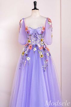 Make an elegant statement in this dreamy Lavender Floral Appliques Sweetheart A-Line Long Prom Dress. Delicate floral appliques add exquisite detail to the fitted corset bodice, while detachable puff sleeves add romantic flair. A-line silhouette creates effortless movement with every step. Let your beauty shine through for your special night.
Product Details


SKU: MD0737
Tulle Fabric
Full Length
Size: US 0-16. Check our Size Chart to get your correct size. 
Recommend custom size for plus size.
Free custom size service is available. Email your exact measurements once order is placed. 
Fully lined & Built with bra
Processing time: 10-15 business days. 
If you want to speed up your dress processing time, please put in the link of rush order fee into your shopping cart to check out with the i Accessories Wedding Guest, Detachable Puff Sleeves, Rapunzel Wedding, Mismatched Dresses, Fitted Corset, Rapunzel Dress, Fancy Stuff, Maternity Bridesmaid Dresses, Winter Formal Dresses